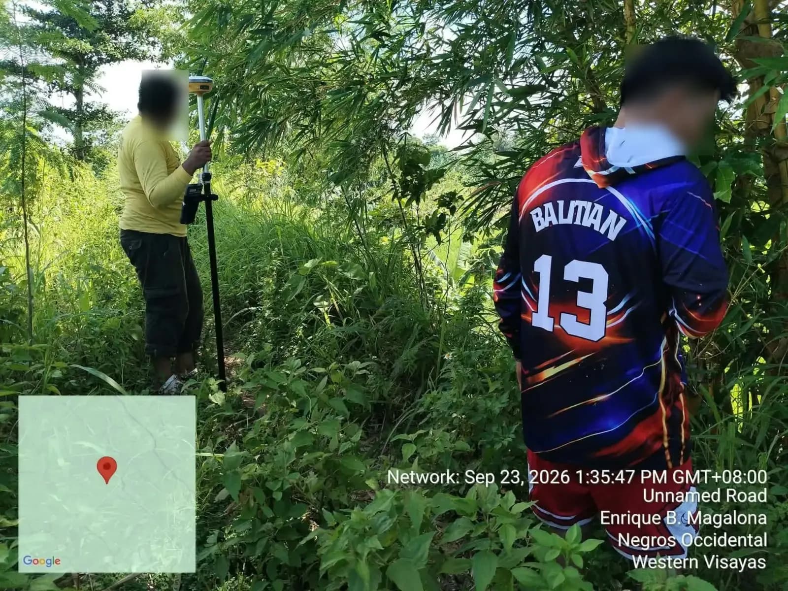 Survey pole held near bamboo and dense vegetation at the E. B. Magalona project site